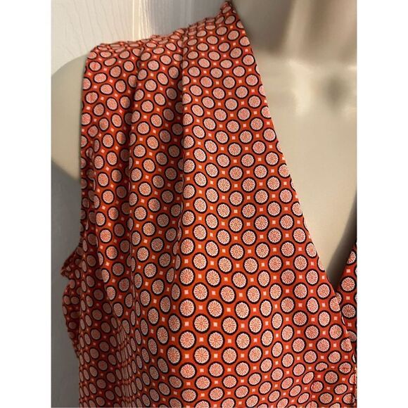 Women's Orangey Red Sleeveless Top. Size Medium. Circular pattern. - Picture 2 of 4